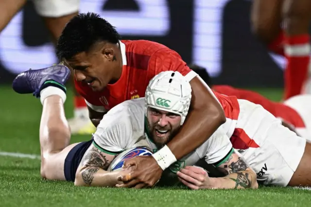 Ireland's Mack Hansen scores a try