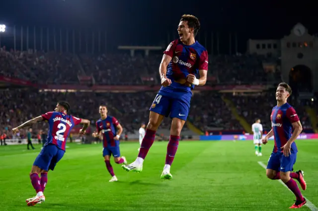 Joao Felix celebrates scoring with his Barcelona teammates