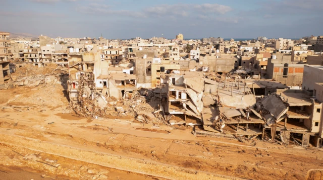 A collapsed building in Derna, destroyed by the force of the flood