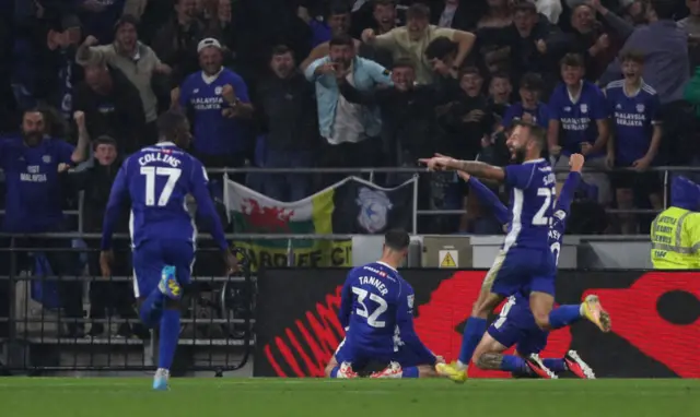 Cardiff City players celebrate Ollie Tanner's goal against Swansea City