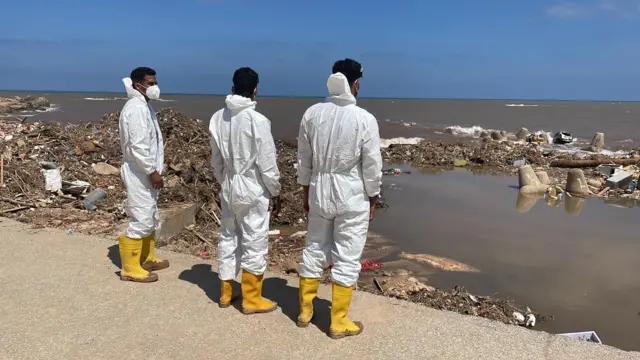 Rescuers looking for washed up bodies from the sea in Derna