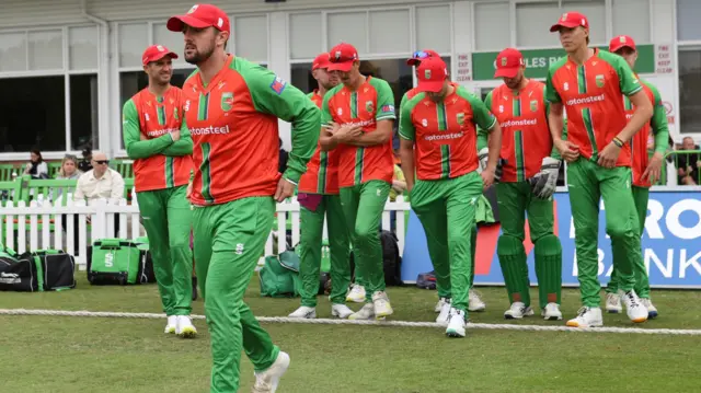 Leicestershire players walking out onto the field