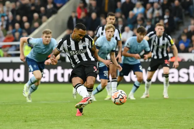 Callum Wilson of Newcastle United scores their sides first goal from the penalty spot