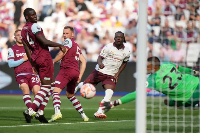 Jeremy Doku scores for Man City