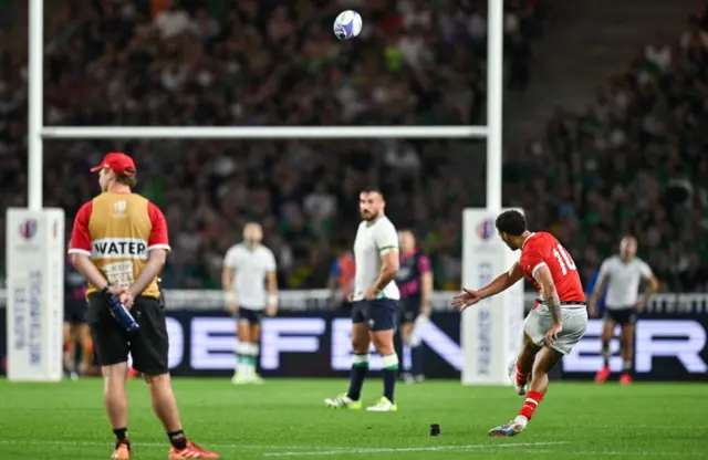 Tonga's William Havili kicks a penalty during