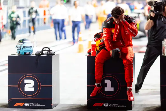 Carlos Sainz looks drained after securing pole position in Singapore