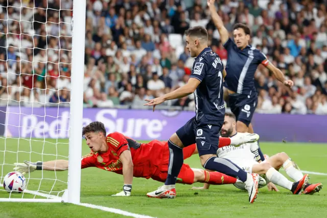 Kepa tries to scramble the ball off the line