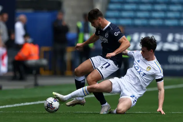 Ryan Longman battles for the ball for Millwall