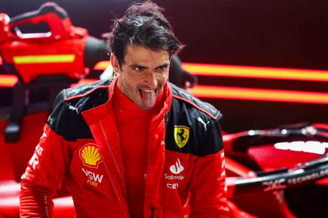 Carlos Sainz sticks out his tongue