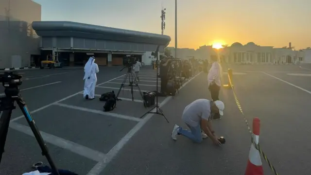 Members of the press on the tarmac at Doha Airport