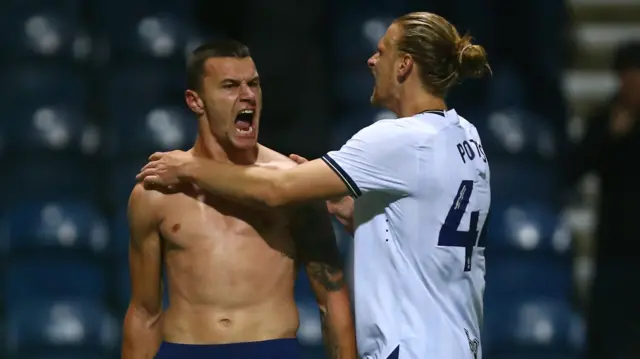 Preston celebrate six wins in a row to stay top of the Championship