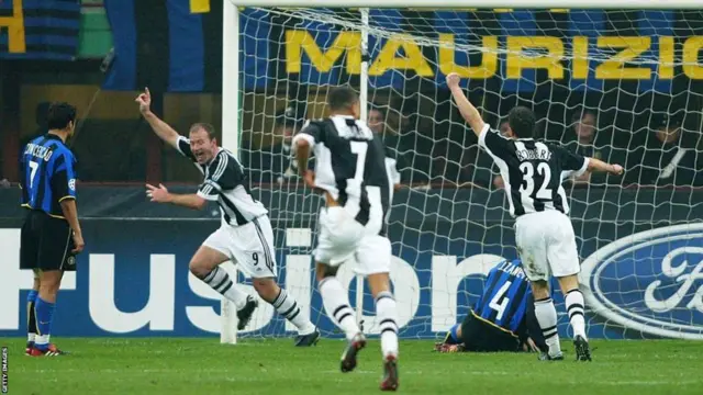 Alan Shearer celebrates scoring for Newcastle in Milan