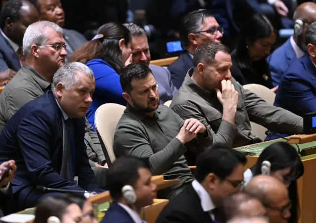 The Ukrainian delegation, listening intently to Biden's speech