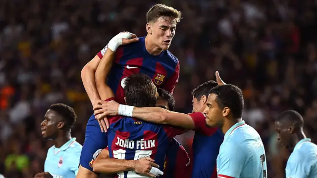 Barcelona celebrate scoring against Royal Antwerp