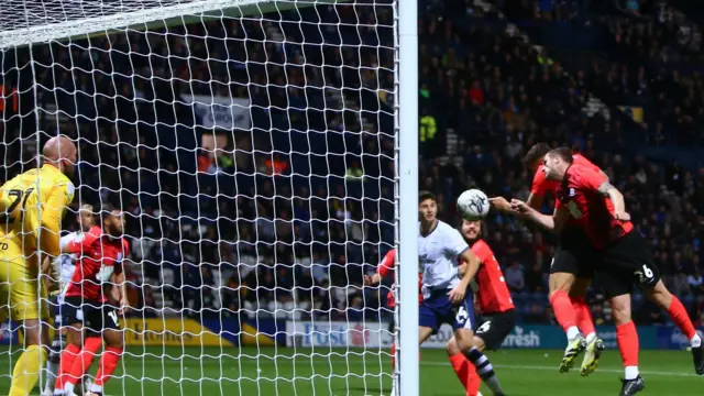 Krystian Bielik heads into his own net