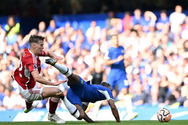 Raheem Sterling is fouled by Nottingham Forest's English midfielder Ryan Yates