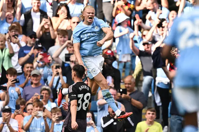 Erling Haaland jumps celebrating after scoring  a hat-trick