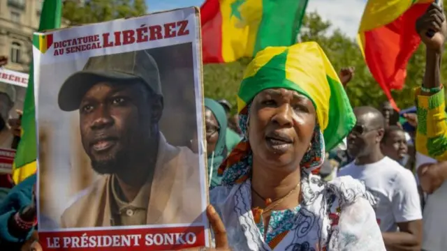 Protestors demonstrate in support of the detained Senegalese opposition leader Ousmane Sonko, at Place de la Republique in Paris on August 19, 2023.