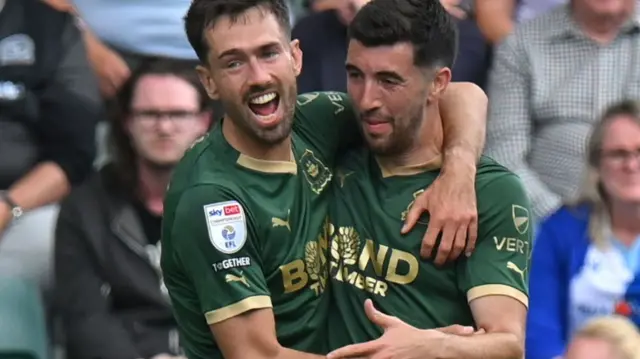 Plymouth players celebrate