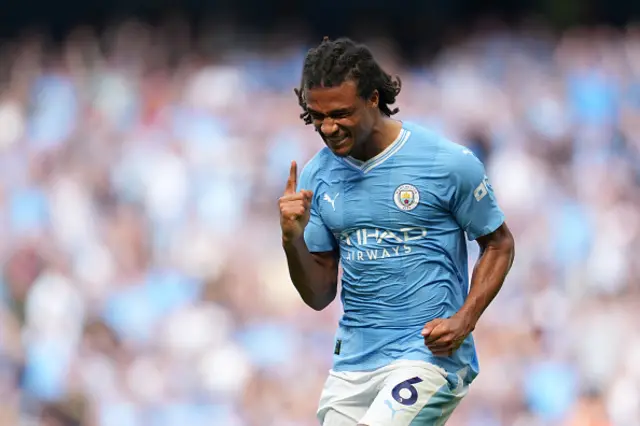 Nathan Ake celebrates after scoring