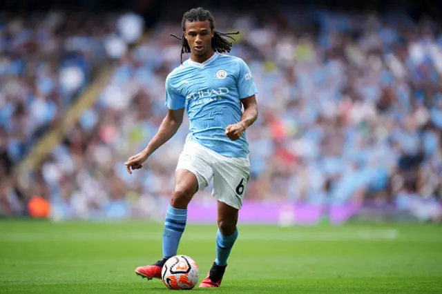 Nathan Ake on the ball for Manchester City