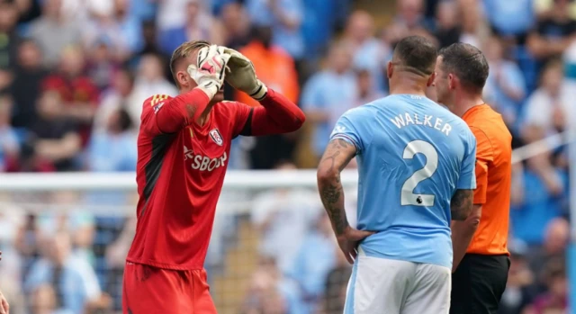 Bernd Leno speaks to the referee after the VAR decision