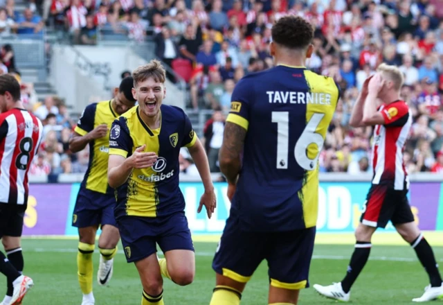 David Brooks celebrates scoring their second goal with Marcus Tavernier