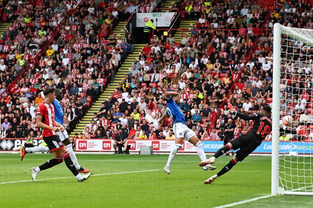 Arnaut Danjuma scores past Foderingham