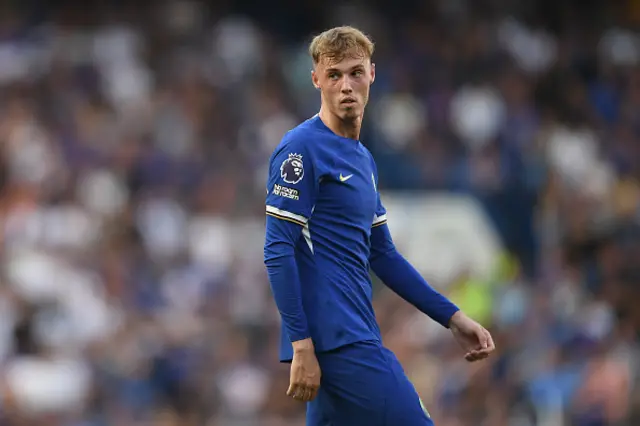 Cole Palmer of Chelsea looks on during the game