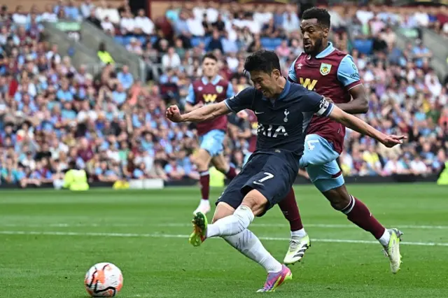 Son Heung-min shoots scoring his fifth goal for Tottenham