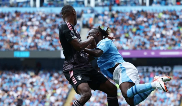 Issa Diop blocks Jeremy Doku