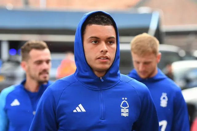 Brennan Johnson arrives at the City Ground with his hood up.