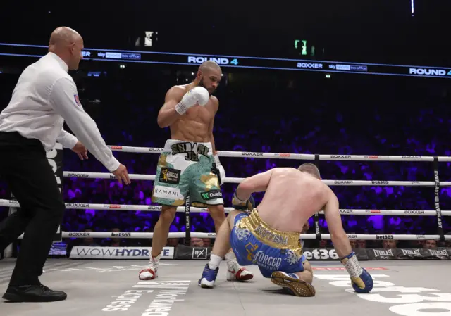 Chris Eubank Jr knocks Liam Smith down