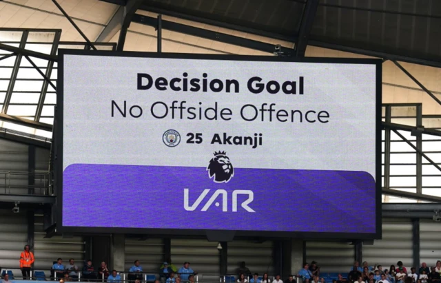 VAR Screen shows Akanji goal approved