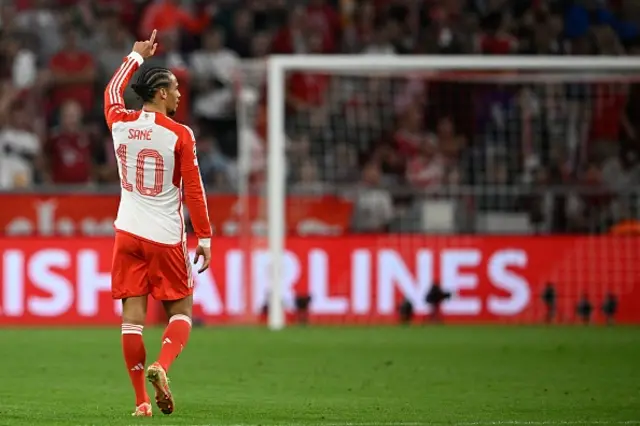 Leroy Sane celebrates scoring the opening goal