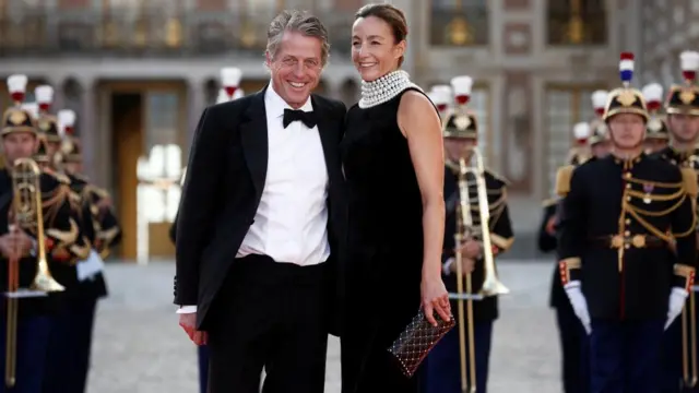 Hugh Grant and  Anna Elisabet Eberstein on the red carpet