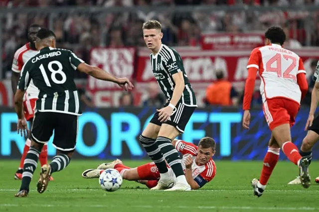 Casemiro and McTominay battle for the ball off Bayern Munich