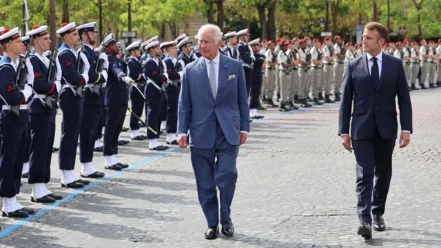 Charles and Macron inspect soldiers