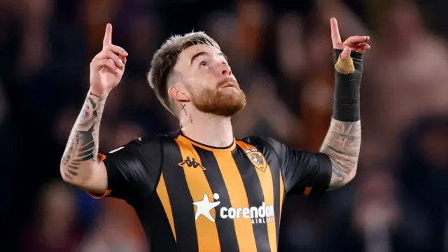 Aaron Connolly points in celebration of his goal for Hull