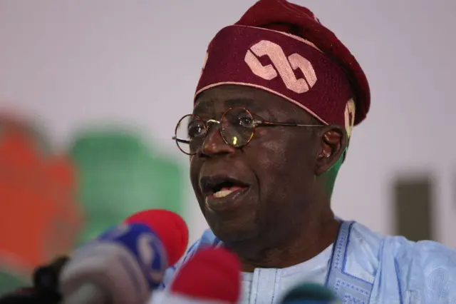 Ruling party candidate Bola Tinubu, addresses supporters in Abuja on March 1, 2023 during celebrations at his campaign headquarters