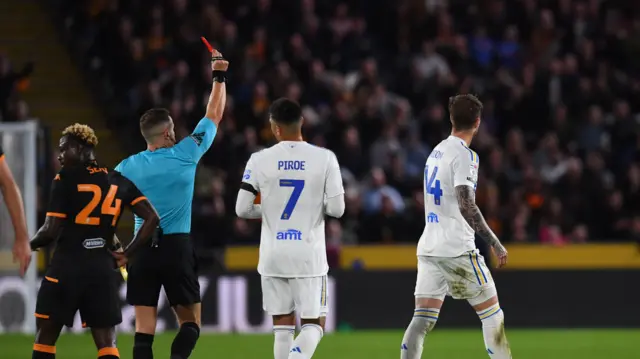 Joe Rodon is shown the red card