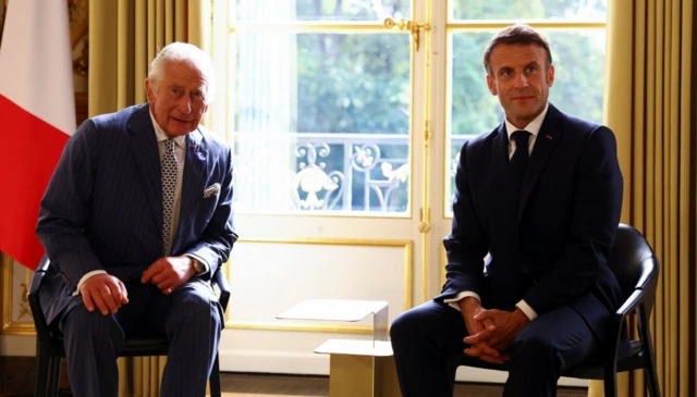 King and Macron in the Élysée Palace