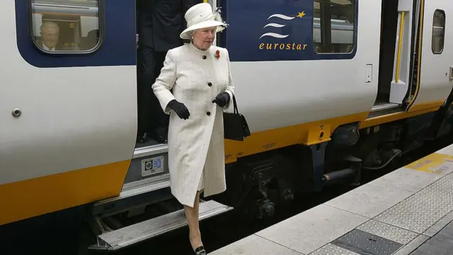 Queen Elizabeth II disembarks the Eurostar in Paris