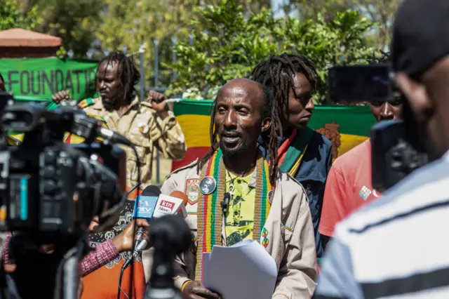 Ras Kimathi Thuo, Chairman of the Nakuru Empress Menen Cultural Group of the Rastafari Sect, addresses the press regarding the recent decision by the Kenya Supreme Court to permit the registration of associations for the lesbians, gays, bisexuals, transgender, queer, intersex (LGBTQI+) community.