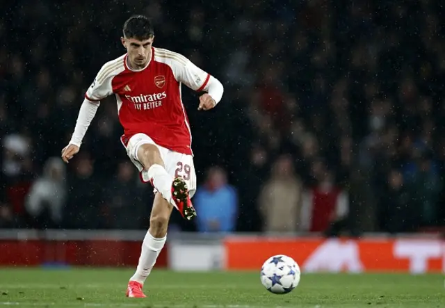 Kai Havertz of Arsenal FC in action this evening passing the ball