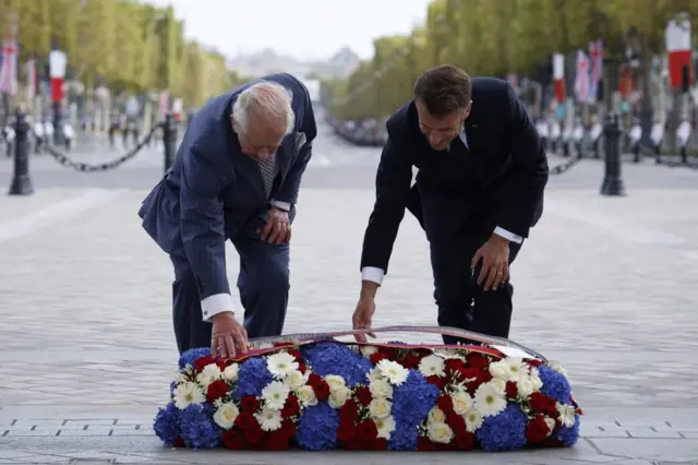 King Charles and president Macron lay a wreath