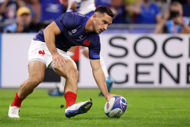 Baptiste Couilloud of France scores the team's ninth try