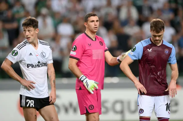 Martinez pats Chambers on the back after a clearance from the Legia striker.