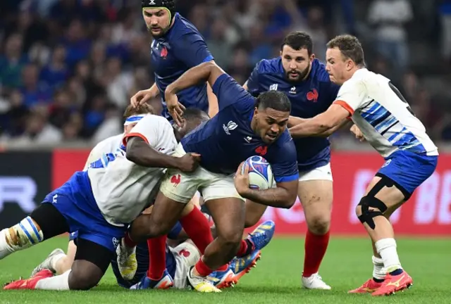 France's hooker Peato Mauvaka is tackled during the France