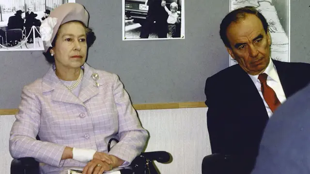 Queen Elizabeth II sitting with publisher Rupert Murdoch at The Times monthly conference in 1985